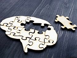 Gehirn in Puzzleform, Symbolbild für Demenz